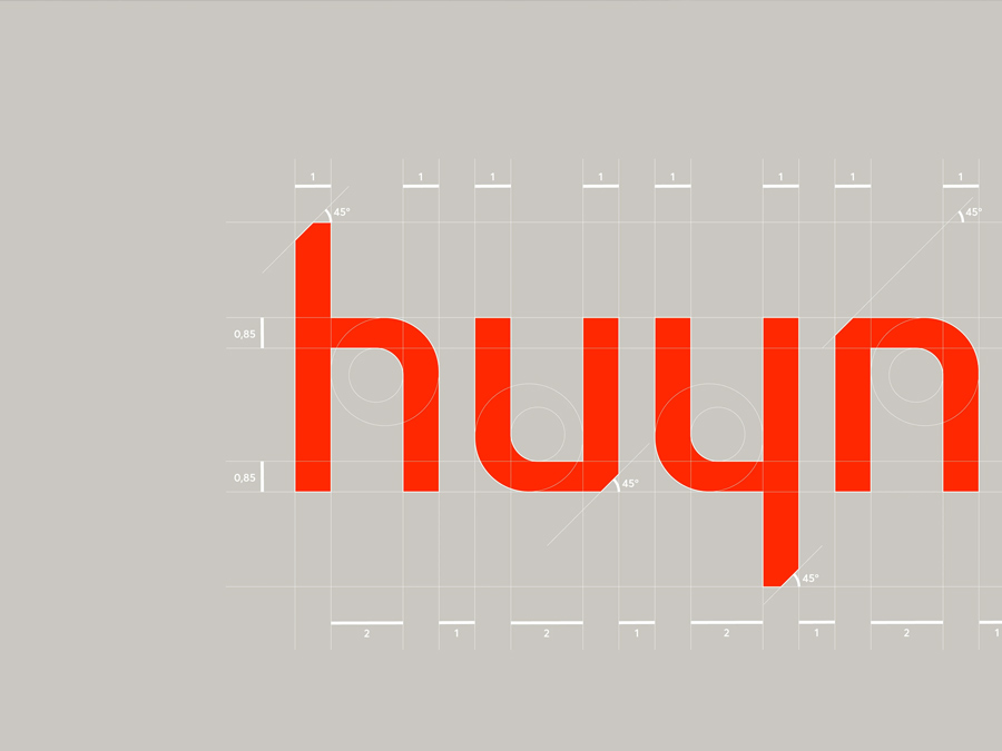Lưới thiết kế logo Huynchi do Vũ Digital thực hiện.